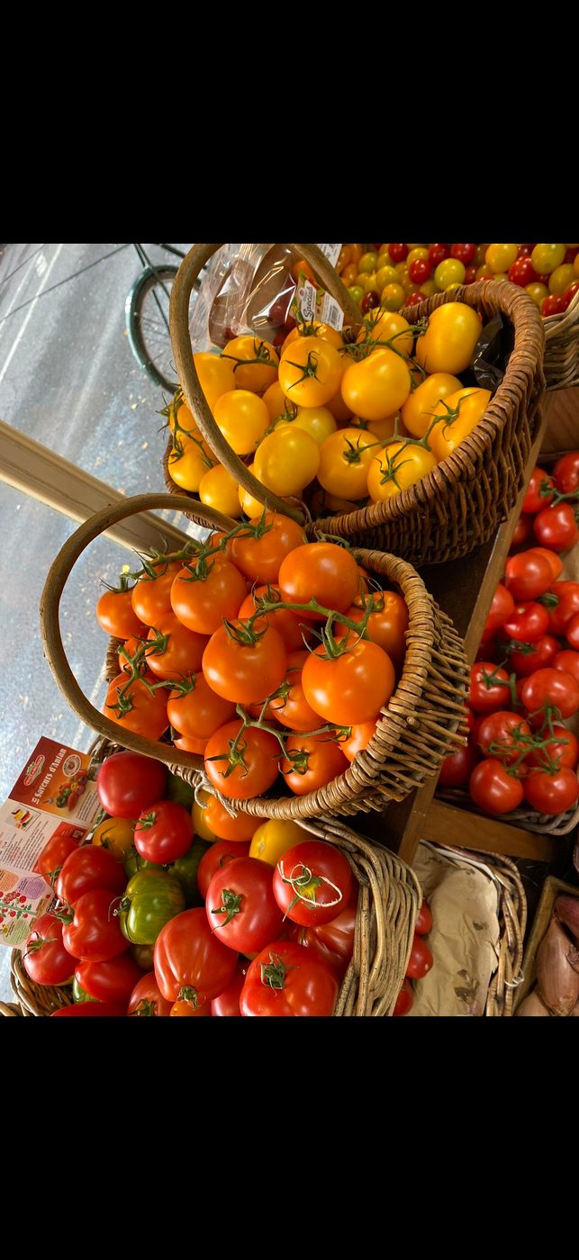 Heritage tomatoes in baskets